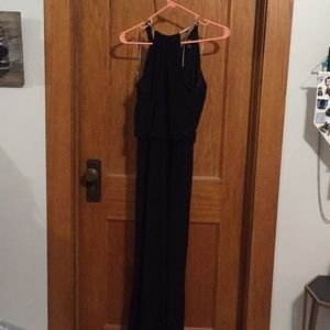 Slinky black maxi with gold metal neck detail